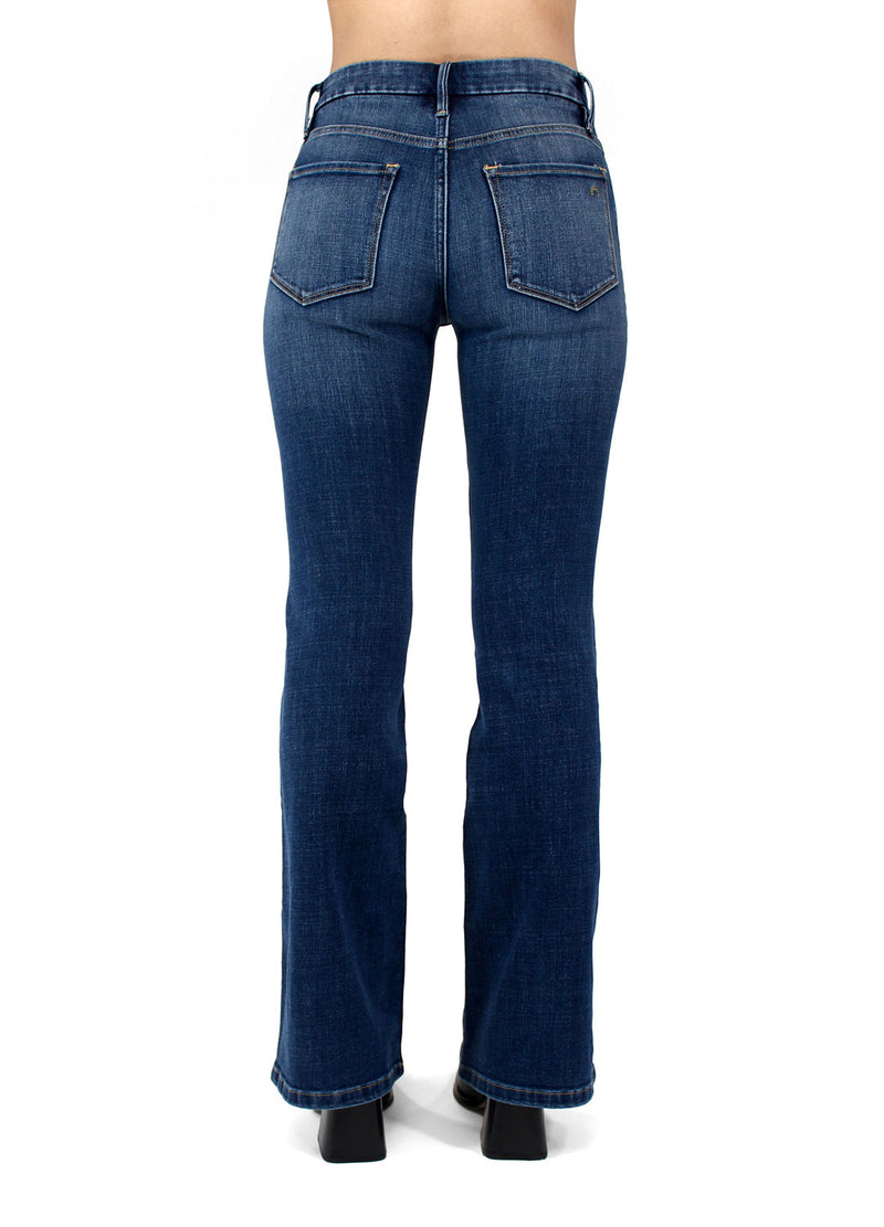 Back view of the Porter Blue Apparel Delilah Mid Rise Sustainable Denim Bootcut in Abbie Wash