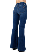 Back Angle View of the Porter Blue Apparel Jolene Mid Rise Sustainable Denim Flare in Vera
