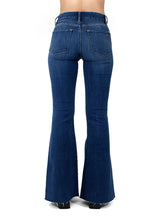 Back View of the Porter Blue Apparel Jolene Mid Rise Sustainable Denim Flare in Vera