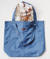 Weekender Eco Friendly Denim Tote carrying cotton flowers by Porter Blue Apparel